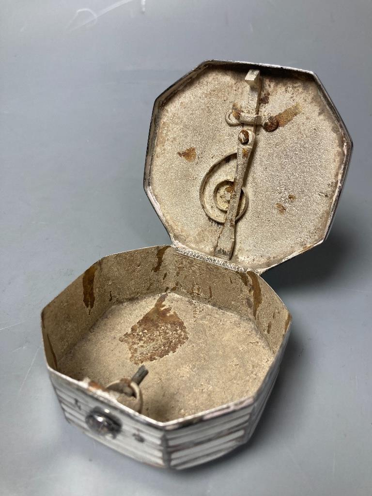 A silver plated puzzle box, 1754, and two boxed Russian beakers, 7.5cm